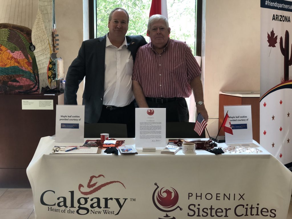 The Calgary Committee booth with John Rice (left) and Aron Charad (right)
